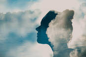 Silhouette of a woman with clouds signifying health concerns