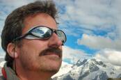 Jon Kern, co-author of Agile Manifesto, wearing sunglasses with mountain in the background