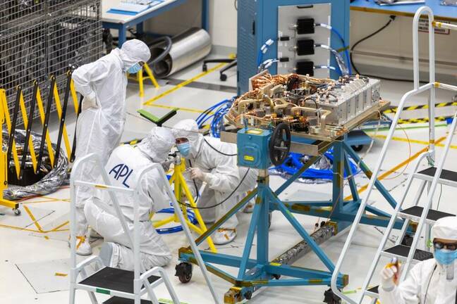 Jet Propulsion Laboratory, Pasadena, California, USA - March 13, 2023: A team of engineers is at work on the Europa Clipper orbiter inside the clean room and assembly hall at JPL.