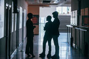 coworkers in the hallway