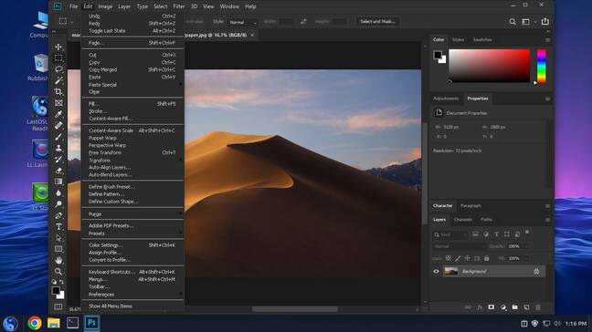 Inexplicably, LastOS includes the macOS Mojave wallpaper, as here opened in PhotoShop. Photoshop on WINE on Last OS, showing the macOS Mojave wallpaper and the Edit menu