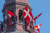 danish flags in copenhagen parliament