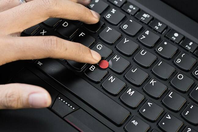 Finger touching TrackPoint. Image by Tinh tế Photo, Creative Commons 1.0.