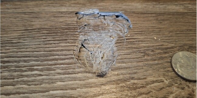 Hole in an Atlanta floor caused by the McDonough Meteorite 