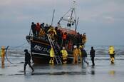 Dungeness, Kent, UK, 6th February 2023. Migrants brought ashore after being rescued at sea by RNLI after travelling across europe. 