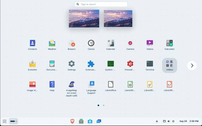 Zorin OS 18 with full-screen GNOME-style app overview and Windows 11 style centered taskbar icons