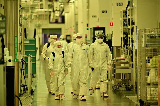 Access to Fab52's inner workings requires donning a "bunny suit" designed to protect the wafers and equipment from contamination