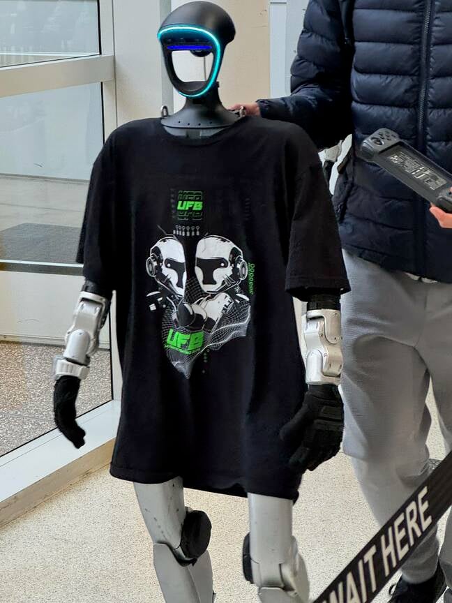 Image of a humanoid robot arriving at the Humanoids Summit