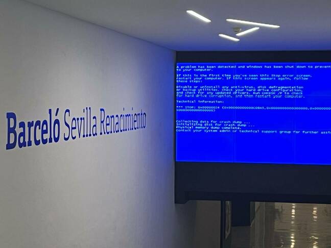 What's On screen at a conference center showing a Blue Screen Of Death