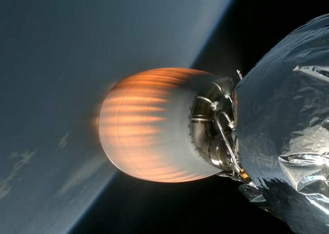 Falcon 9 second stage firing above Earth