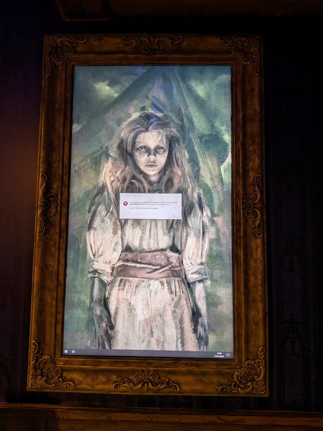 Windows error appearing on a portrait of a girl after a ghost train ride