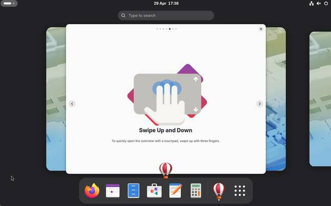 Fedora 44 GNOME tour showing a trackpad gesture without explaining mouse or other alternatives