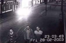 Three of the grinning blaggers caught on CCTV